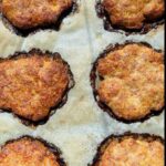 homemade baked burgers in a tray