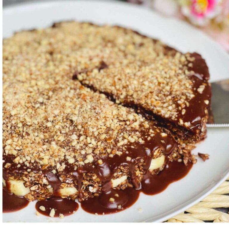 Vegan no-bake banana cake on a white plate.