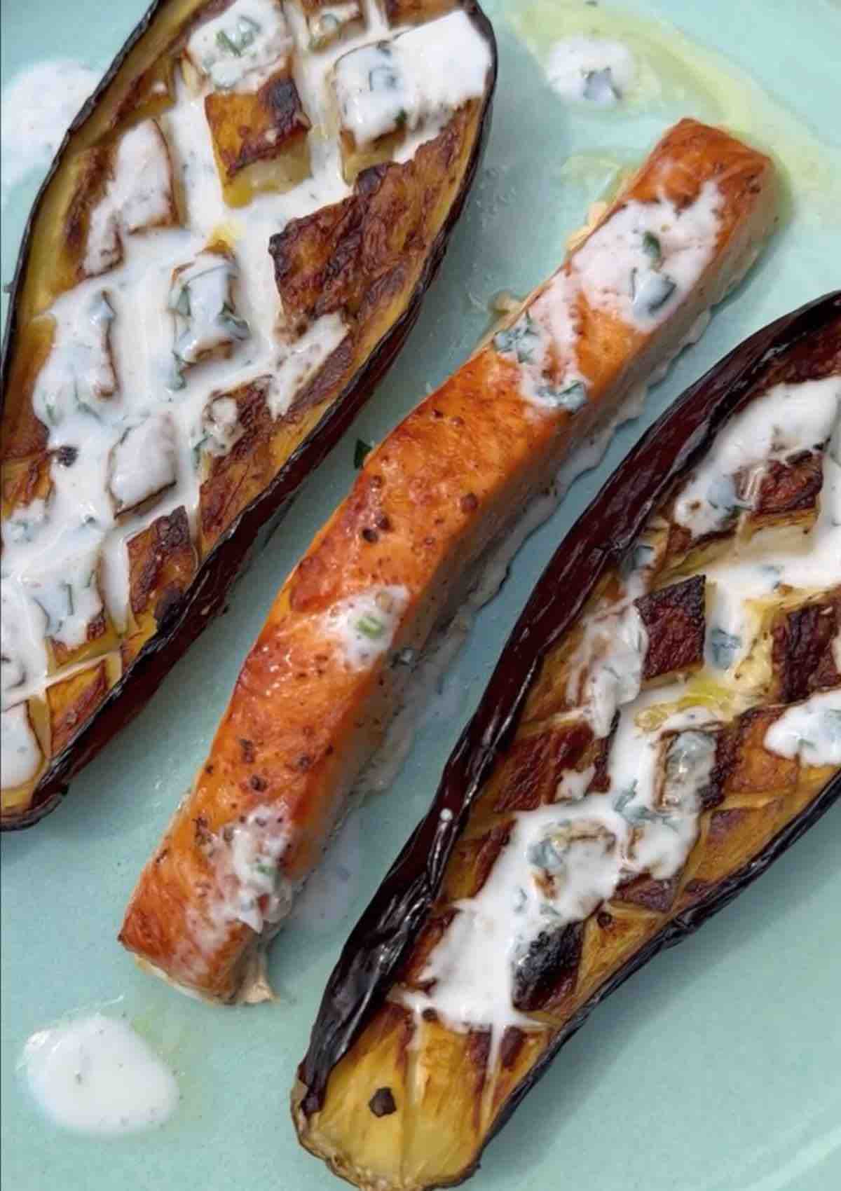 Baked Aubergine with Yogurt Dressing served with baked salmon fillet