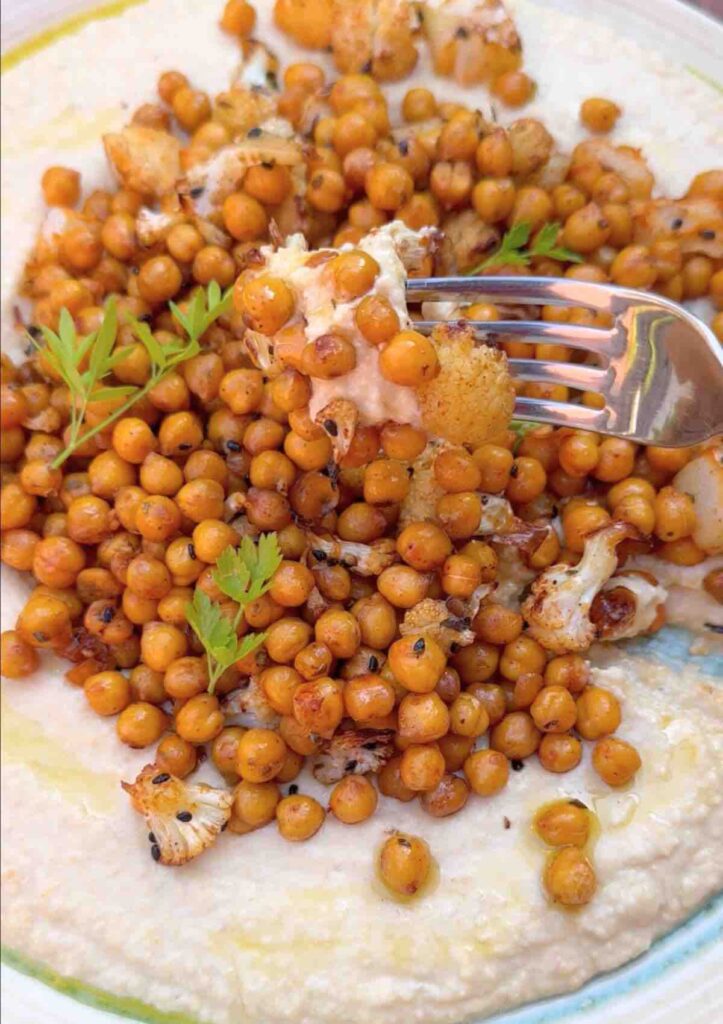 Oven Roasted Cauliflower and Chickpeas with Hummus.