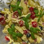 Potato salad in a glass bowl.