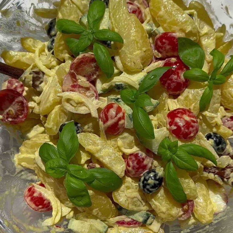 Potato salad in a glass bowl.