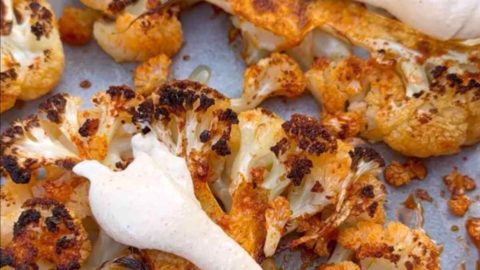 Roasted Cauliflower Steaks topped with Tahini Sauce