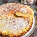 Flourless yogurt cake topped with powdered sugar