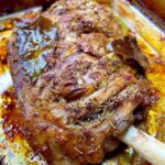 Roast Lamb stuffed with Rosemary and Garlic in a pan