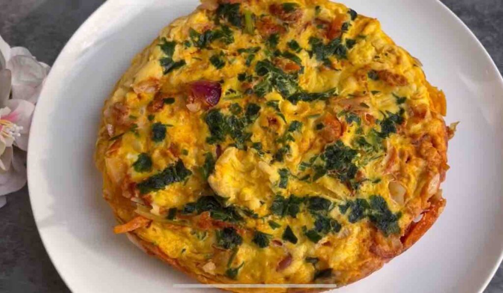 Easy Cabbage Frittata Recipe | Low-Calorie & Veggie-Packed Breakfast  on a plate ready to be served. 