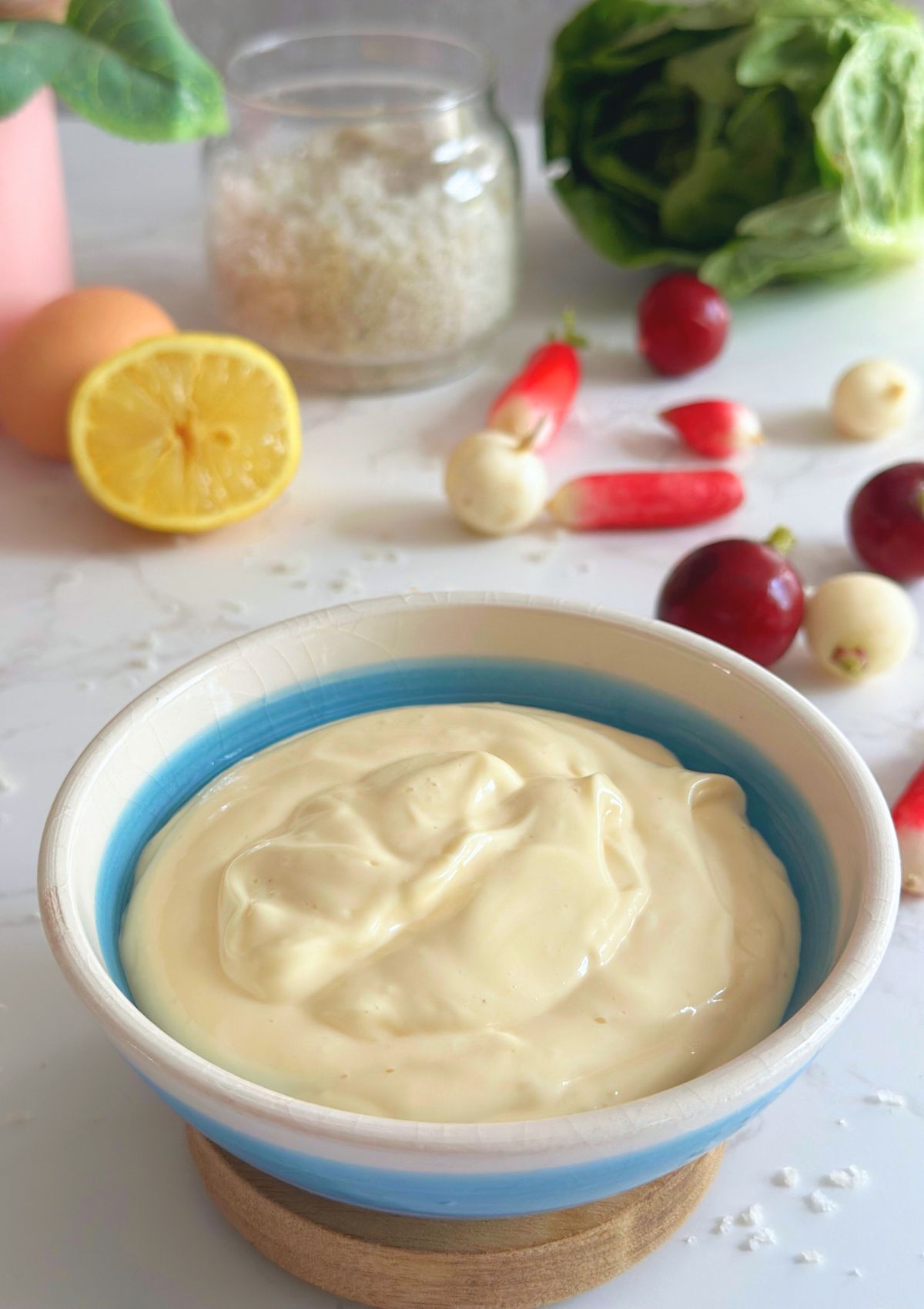 A bowl of homemade mayonnaise made with 4 ingredients.