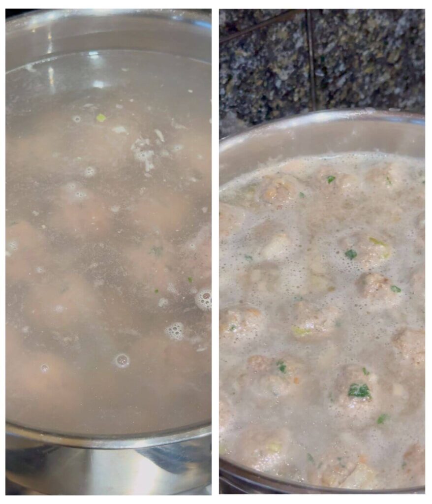 Meatballs cooking in a pot of water, with some floating to the top as they finish cooking.