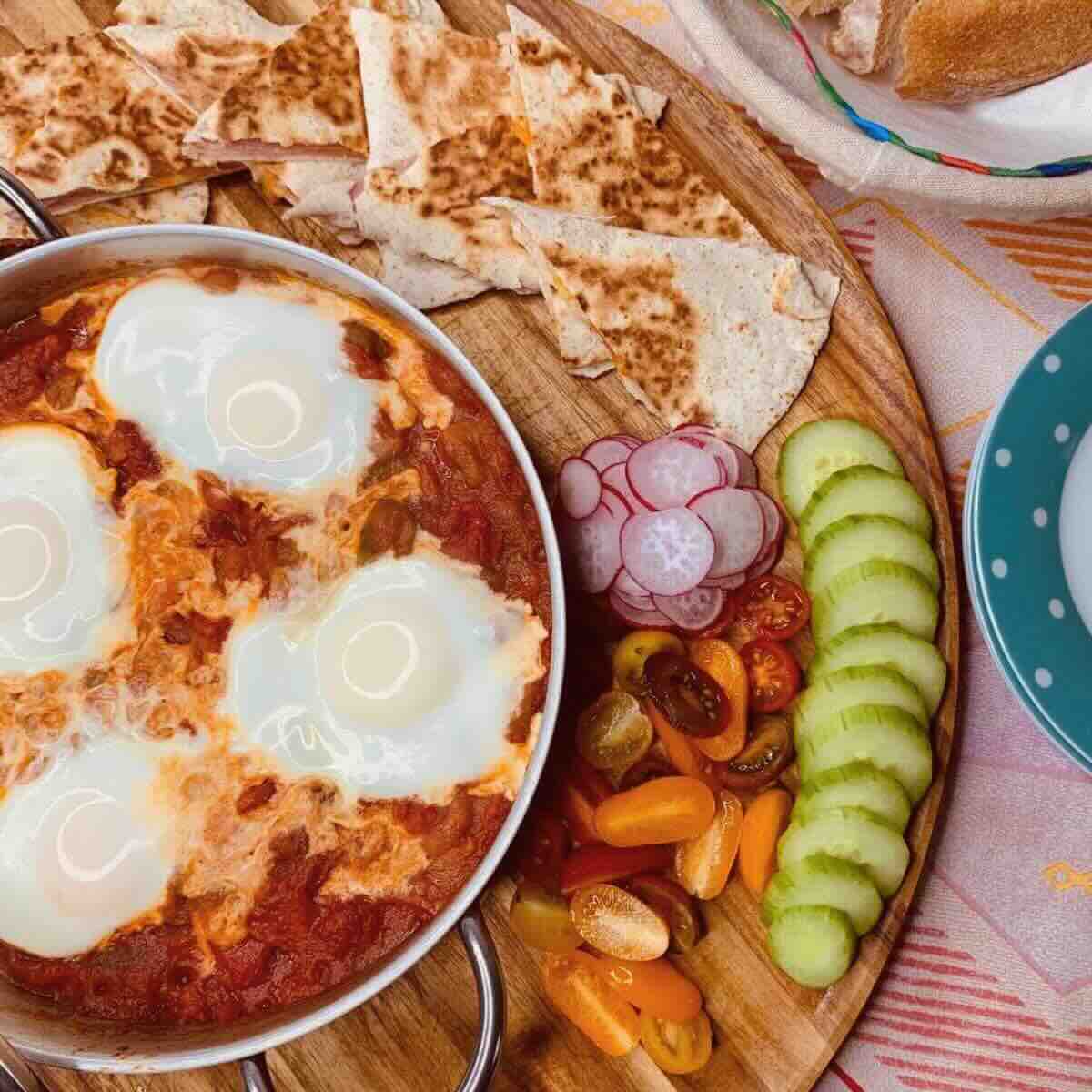 Roasted peppers with baked eggs in a pan