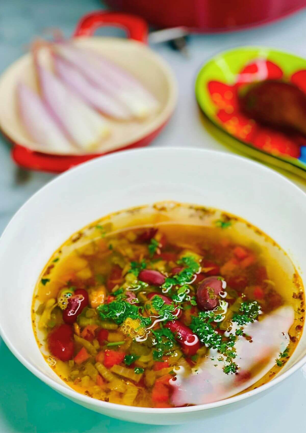 A bowl of Traditional Romanian Bean Soup (Ciorba De Fasole). 